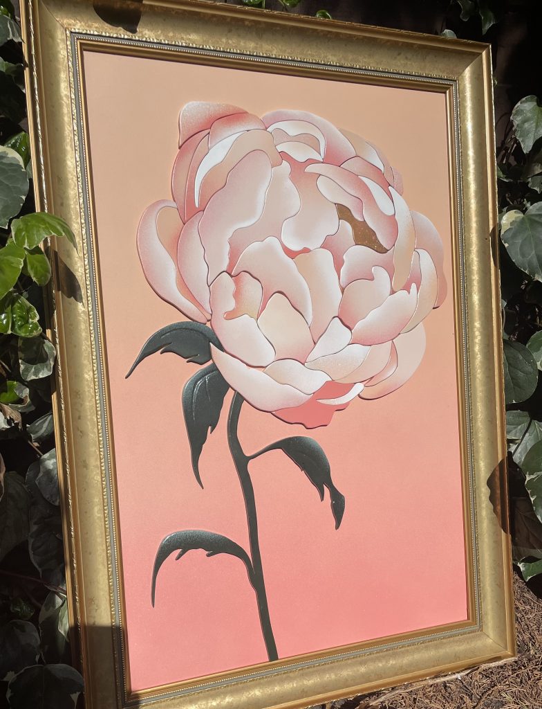 Wooden artwork made using a scroll saw.